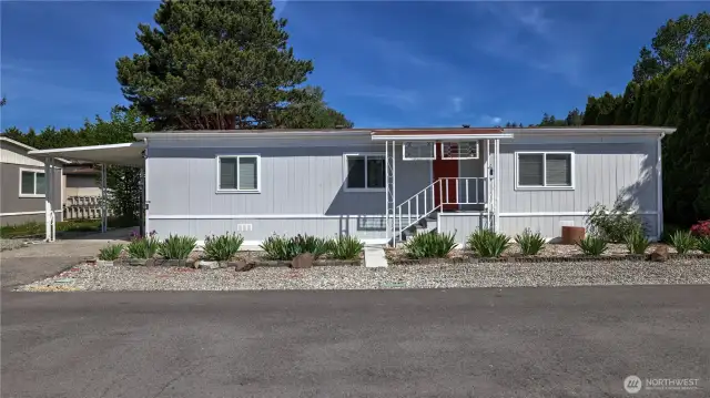 Welcome to Walnut Grove! This darling 55+ community is situated in the heart of Kent just minutes to local shops, dining, major freeways, Green River & other local amenities. Enjoy peace of mind in this home w/newer vapor barrier, exterior paint, & modern laminate flooring throughout the main living spaces. The living room offers ample configuration opportunities w/an open concept layout flowing into the kitchen & dining room seamlessly. Kitchen features white cabinets, breakfast bar seating, open sight lines to the living room, plus both formal & informal dining space. Retreat to the large primary w/a 3/4 bath en suite, plus spacious 2nd bedroom w/an additional 3/4 guest bath. Buyer subject to park approval, cats/dogs ok w/approval.