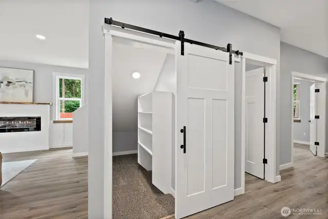 Abundant Storage Behind the Modern Barn Door!