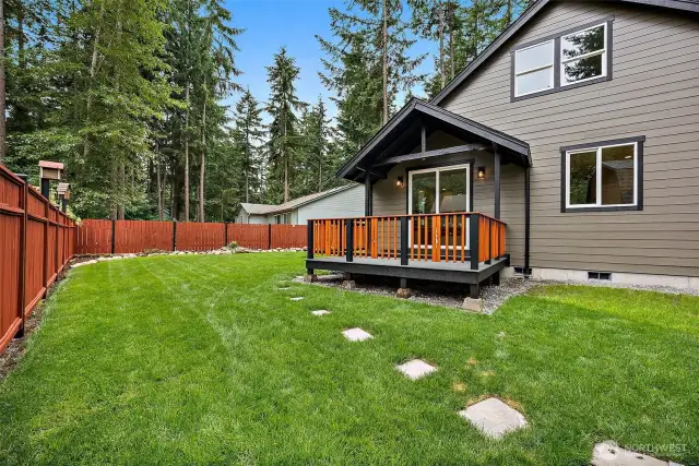 Set Pavers Lead to to Poured Pathway Along the Side of the Home!