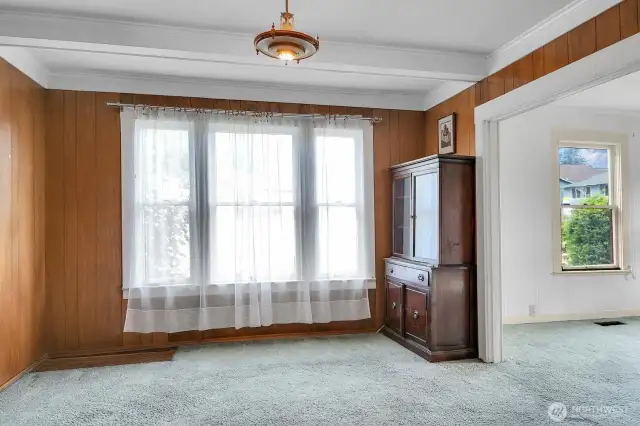 The spacious living room will welcome a large table.