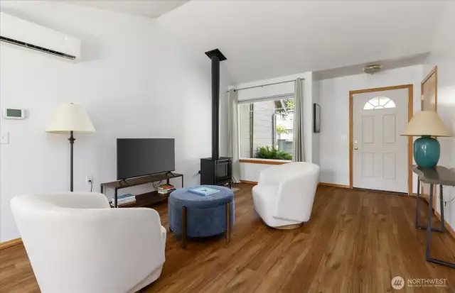 Warm and inviting, this cozy living room, provides the perfect spot to unwind and relax.