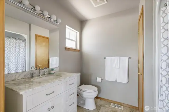 Private en-suite bathroom for comfort and convenience.