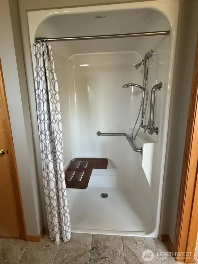 Accessible shower in primary bath.