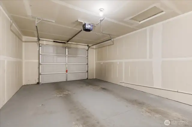 Bright, clean one car garage - perfect for your vehicle and extra storage needs