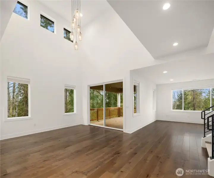 Dining area with high ceiling