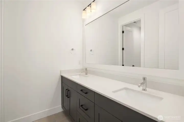 basement shared dual sink bathroom