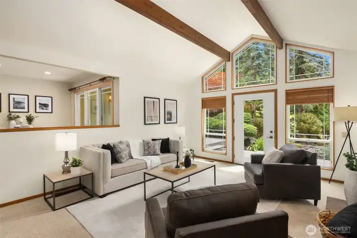 Family room with soaring beamed ceiling make this a very inviting gathering spot