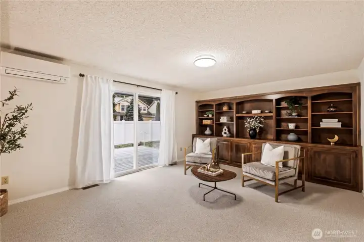 Built-ins for showcase items, books, art, with storage underneath.