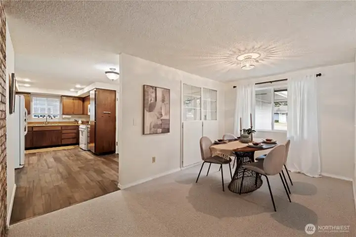 Large dining area with convenient access to kitchen.