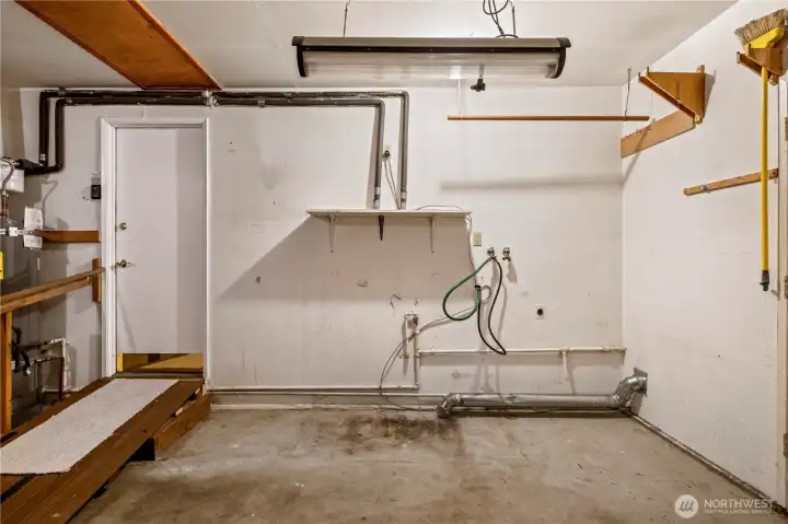 Washer/Dryer hookups in garage, with removable ramp access to kitchen.
