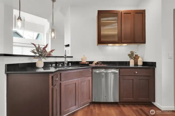 Clean lines and warm finishes in this inviting kitchen.