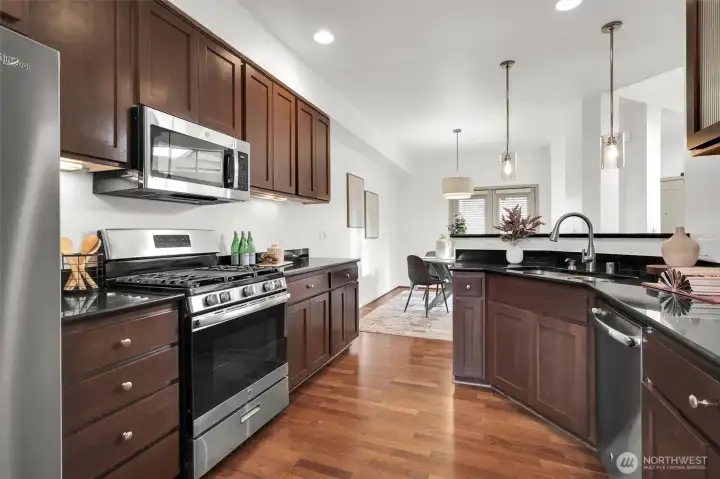 Spacious kitchen with room to prep, cook, and gather.