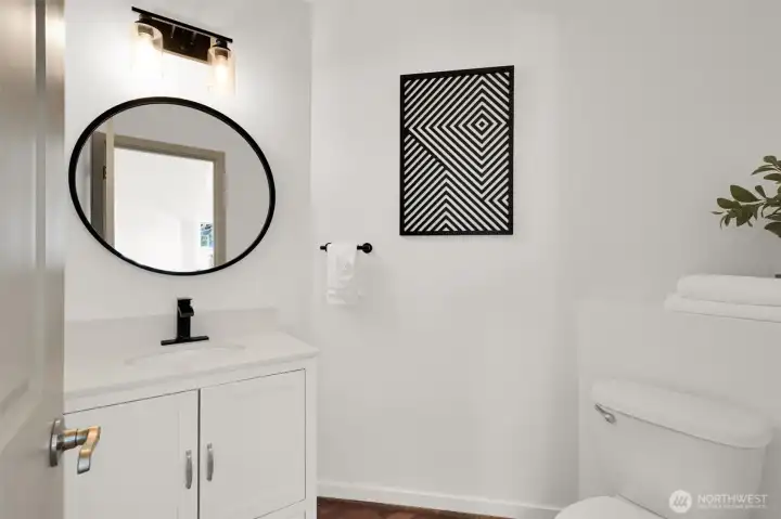 Updated guest bathroom with modern finishes and clean design.