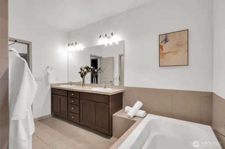 Spa-like master bathroom feels like a private retreat.