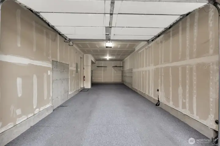 TWO-CAR TANDEM GARAGE with excellent storage potential or home gym!