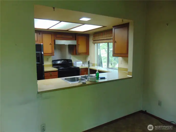 Kitchen with pass through to Great room.