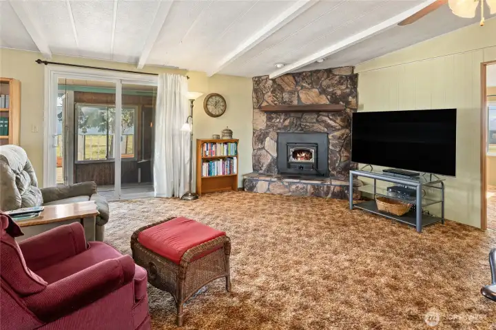 Family room with sliding glass door to the back deck