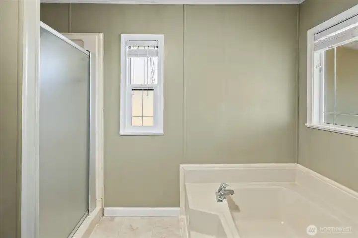 Primary bath with soaking tub and walk-in shower!