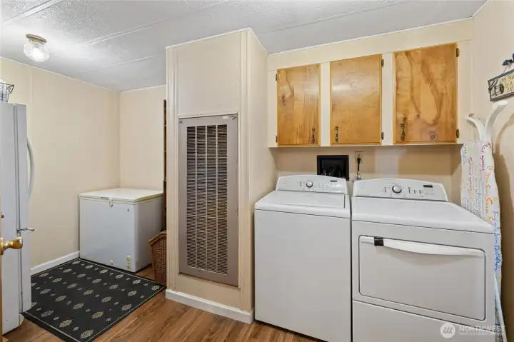 Large laundry room with plenty of space for additional refrigerator and freezer!