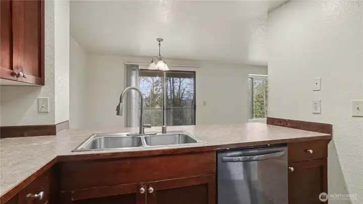 Kitchen opens to the living and dining room areas; perfect for entertaining.