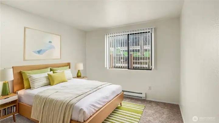 Virtually staged guest bedroom.