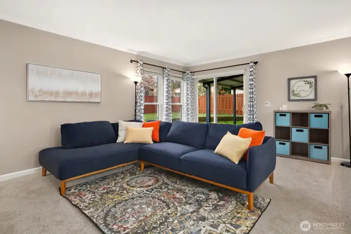 Light and bright family room with large windows.