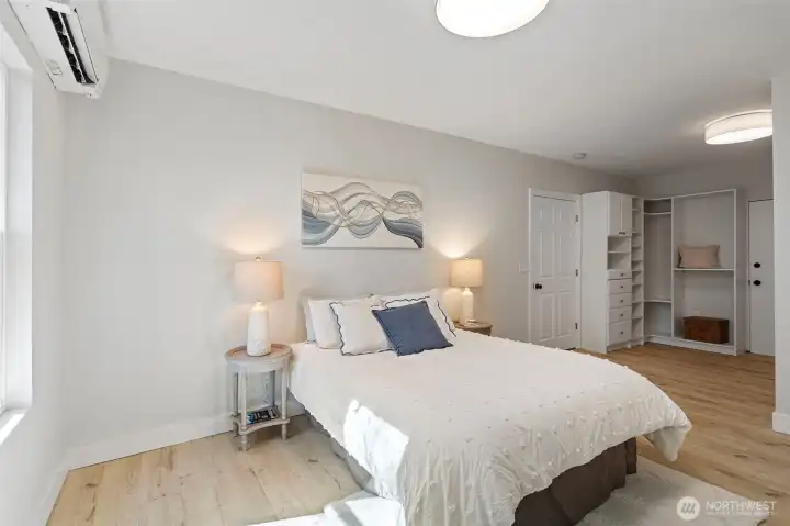 Room for a king, a mini-split for every season, and a custom walk-in closet straight ahead.