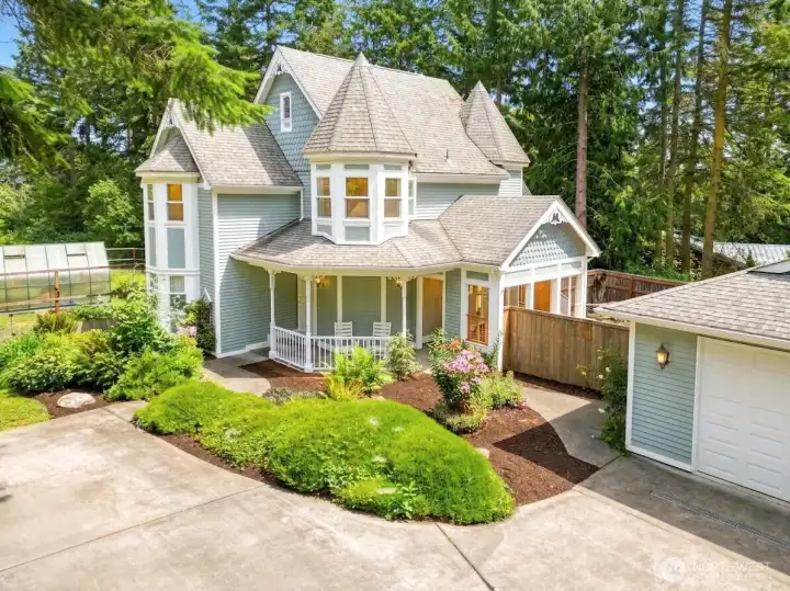 Storybook architecture and unforgettable curb appeal with meticulously landscaped grounds, timeless Victorian-inspired design, and a charming covered porch create a first impression that's as rare as it is inviting. Storybook architecture and unforgettable curb appeal with meticulously landscaped grounds, timeless Victorian-inspired design, and a charming covered porch create a first impression that's as rare as it is inviting.