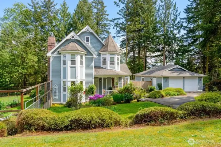 A rare blend of timeless architecture, manicured landscaping, and exceptional privacy. Complete with a detached garage, this one-of-a-kind property stands apart from anything else on the market in Port Hadlock. A rare blend of timeless architecture, manicured landscaping, and exceptional privacy. Complete with a detached garage, this one-of-a-kind property stands apart from anything else on the market in Port Hadlock.