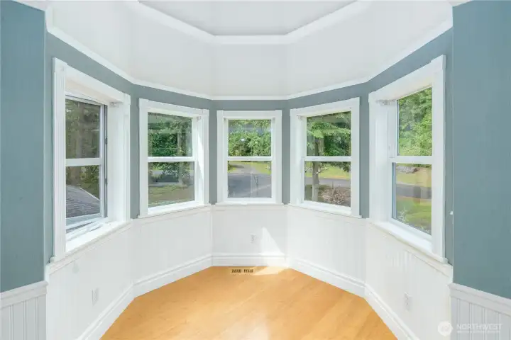 The signature turret creates a breathtaking architectural focal point, wrapping this space in windows that fill the room with natural light and tranquil views—an enchanting nook for reading, relaxing, or simply taking in the beauty outside. The signature turret creates a breathtaking architectural focal point, wrapping this space in windows that fill the room with natural light and tranquil views—an enchanting nook for reading, relaxing, or simply taking in the beauty outside.