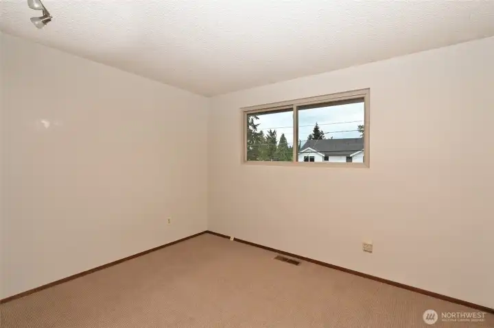 Bedroom number 3 looks to street