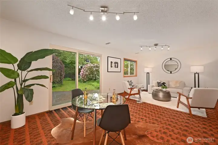 Large family room for entertaining/ play/ opens to patio