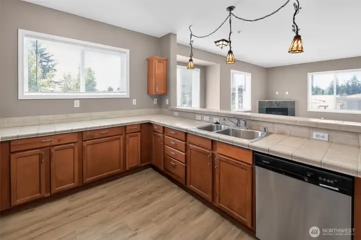Spacious kitchen with bar and open to living area Spacious kitchen with bar and open to living area