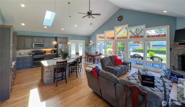 Additional shot of great room towards the wall of windows and covered patio.