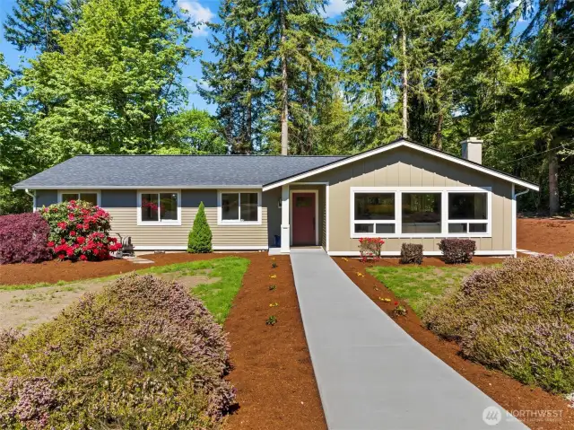 This beautifully renovated home sits on three parcels!