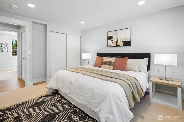 Spacious primary bedroom with ensuite bath