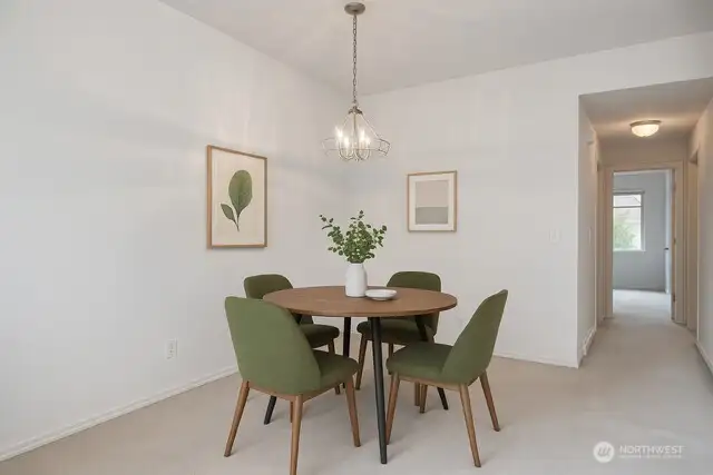 Dining area off of kitchen. Virtually Staged.