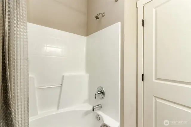 2nd floor full size bathroom with tub and shower.