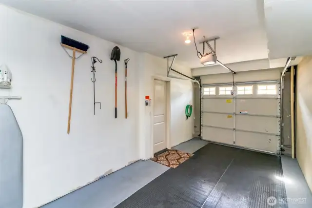 2 car tandem garage with remote opening and walk thru door to upstairs - no need to go outside!