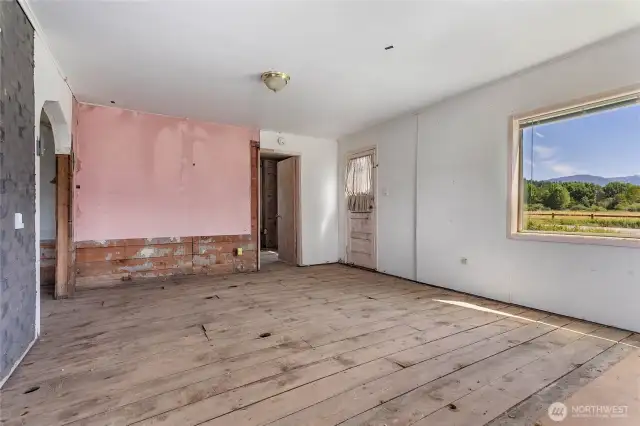 Home was damaged by a water leak. Stripped down to sub-floor and studs in most areas of home.