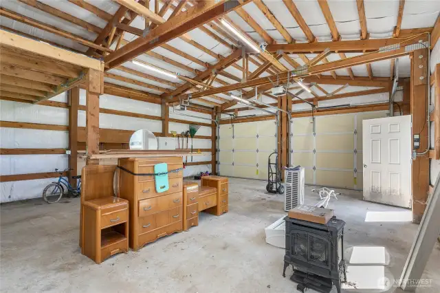 Inside of 2-bay shop. Items in shop do not convey. May leave fridge/freezer.