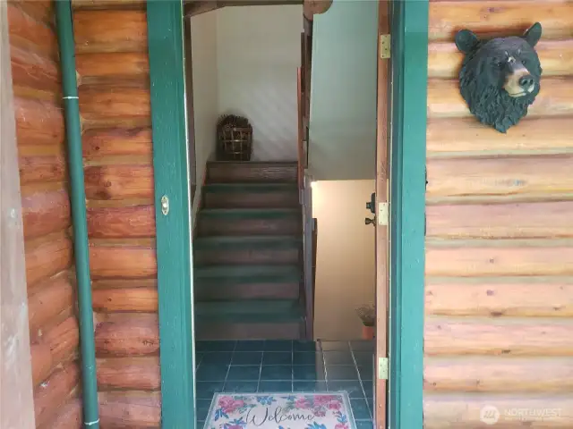 Front entry to main level with Stairs Up and Down