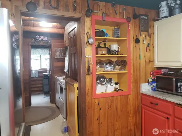 Laundry, mud room & pantry space, bath off the back of kitchen.  Back door out to fully fenced back yard.