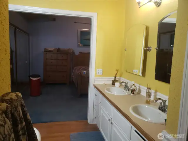 Primary bathroom to bedroom.