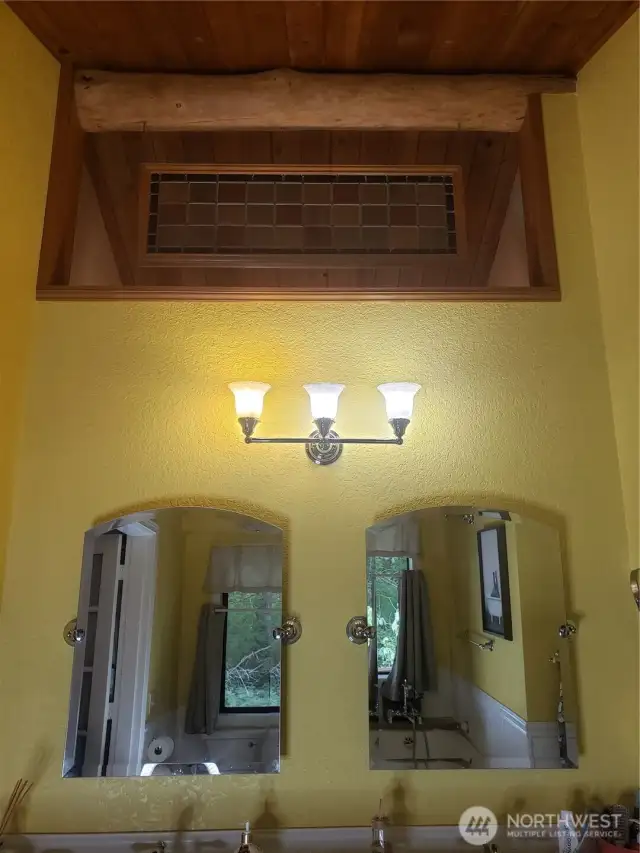 Primary double skinks and vaulted ceilings with stained glass.