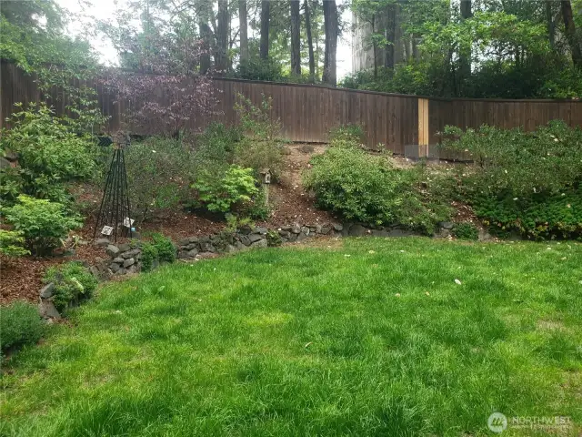 Fully fenced Backyard and landscaping