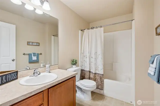 linen closet next to the guest bathroom.