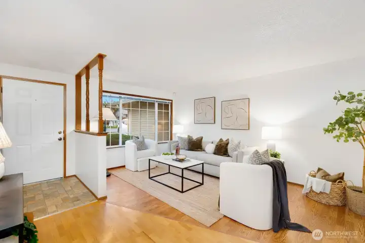 This is living room with a large picture window.