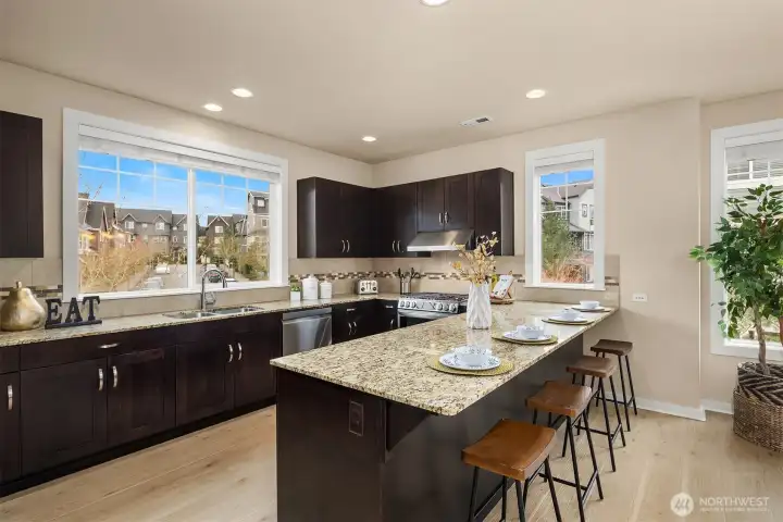 All the best parties happen in the kitchen, and this is a great layout for entertaining