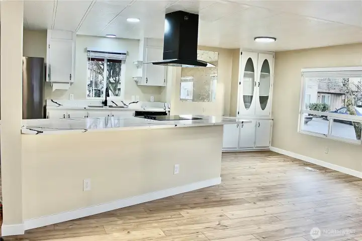 Entering from carport, the kitchen and the living room as well as dining room